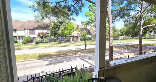a view of a city from a balcony