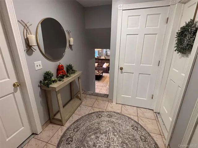 a view of a hallway with washer and dryer