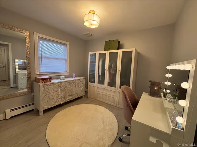 a view of kitchen with furniture and chandelier