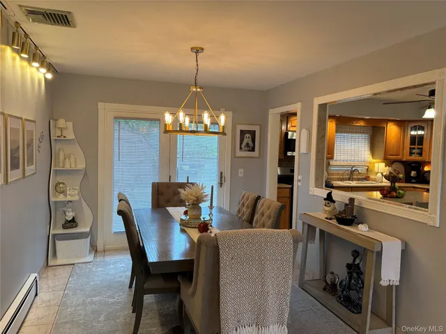 a view of a dining room with furniture
