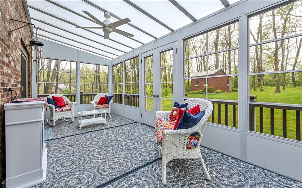 230 Election House Road Butler, PA 16001 - Photo 16 of 38 a living room with furniture and floor to ceiling windows