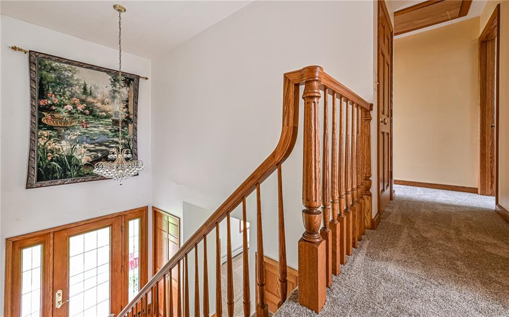 230 Election House Road Butler, PA 16001 - Photo 21 of 38 a view of a hallway with wooden floor and stairs