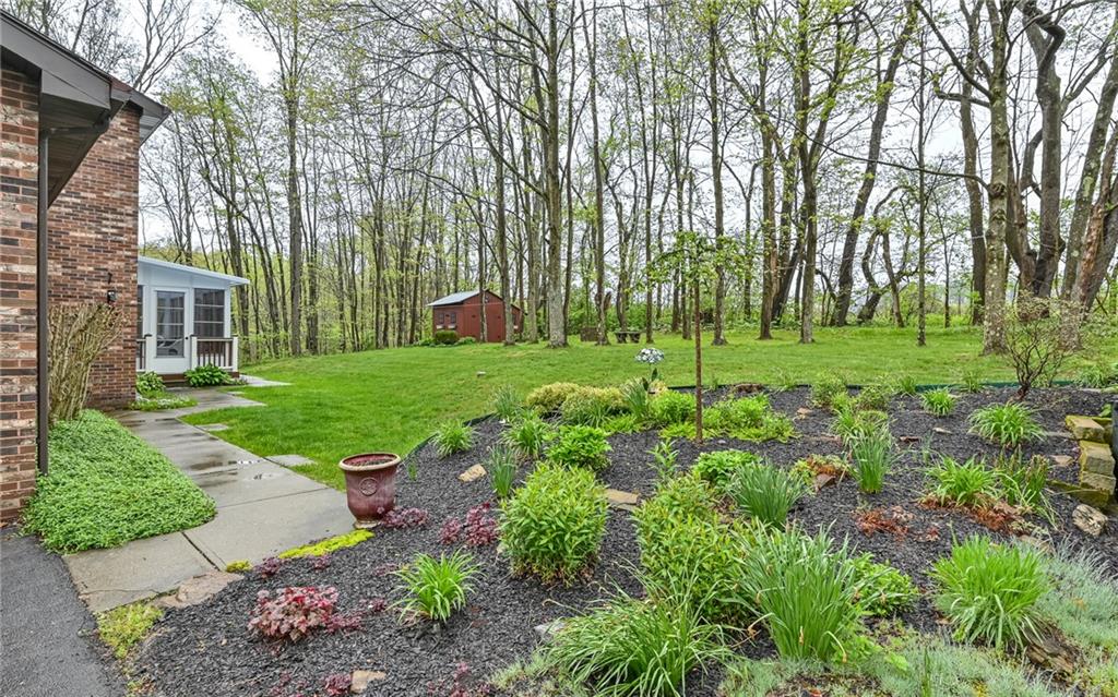 230 Election House Road Butler, PA 16001 - Photo 33 of 38 a view of a backyard with garden