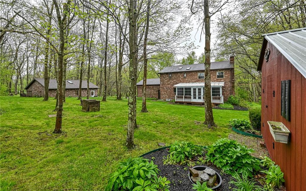 230 Election House Road Butler, PA 16001 - Photo 34 of 38 a view of a backyard with a garden