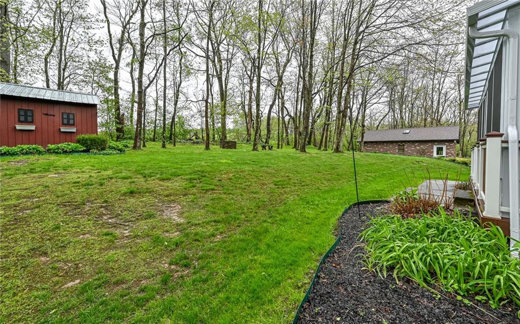 230 Election House Road Butler, PA 16001 - Photo 35 of 38 a view of a backyard with garden