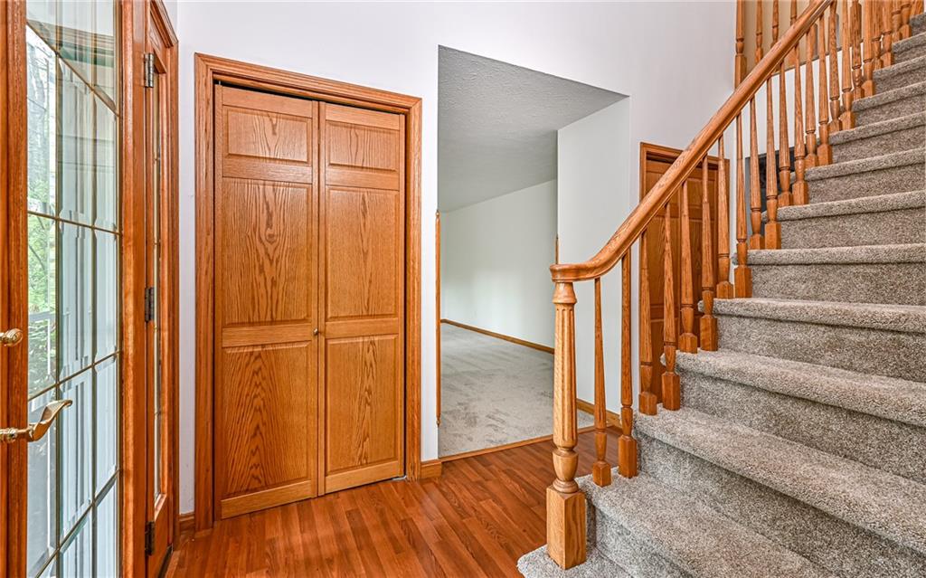 230 Election House Road Butler, PA 16001 - Photo 5 of 38 a view of entryway with wooden floor and staircase