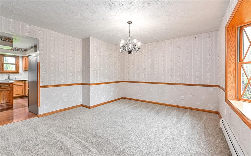 230 Election House Road Butler, PA 16001 - Photo 8 of 38 wooden floor in an empty room with a window