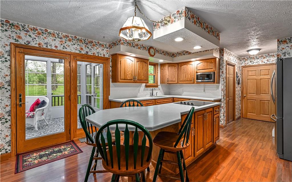 230 Election House Road Butler, PA 16001 - Photo 10 of 38 a view of a dining room with furniture window and wooden floor