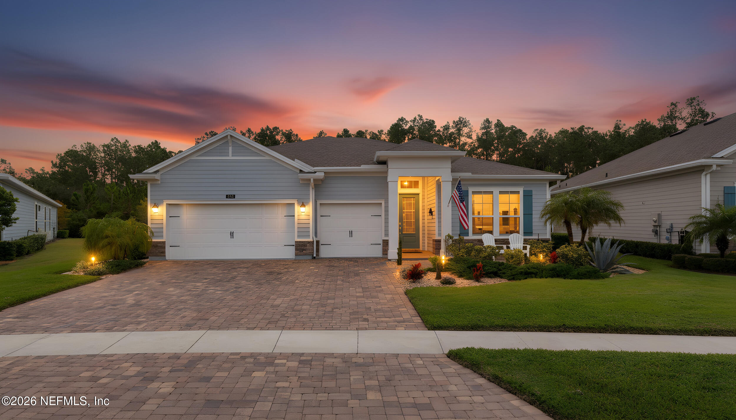311 Dosel Lane St. Augustine, FL 32095 - Photo 37 of 37 a front view of a house with a yard and garage