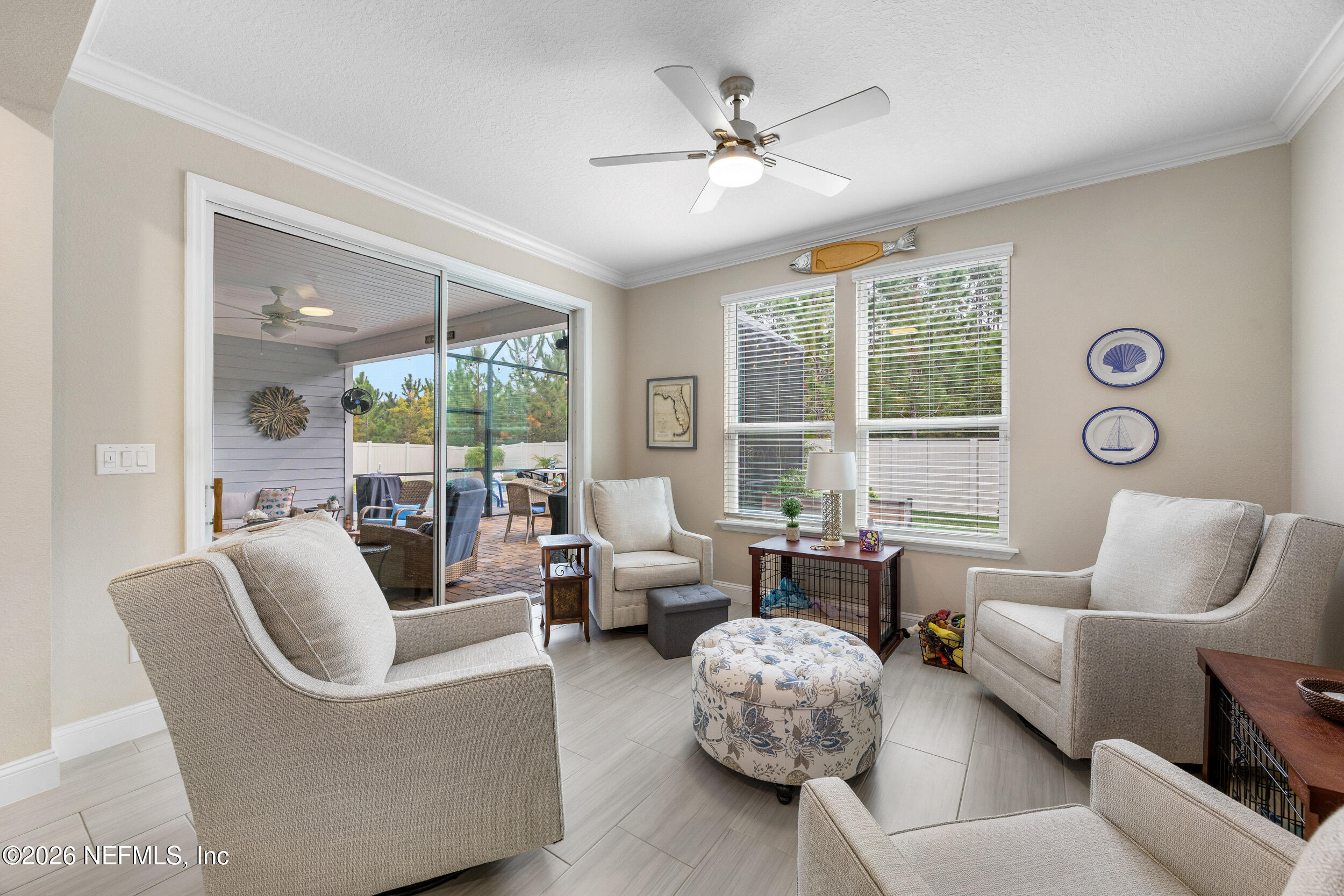 311 Dosel Lane St. Augustine, FL 32095 - Photo 10 of 37 a living room with furniture and a large window