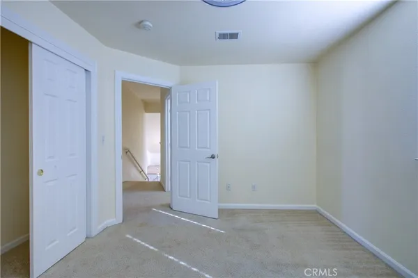 an empty room with an entryway