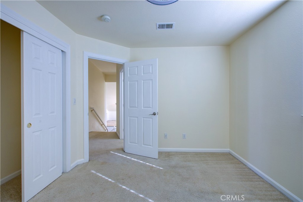 4651 Stern Drive Merced, CA 95348 - Photo 28 of 38 an empty room with an entryway