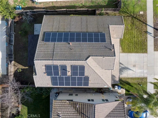 a tall building with a small yard