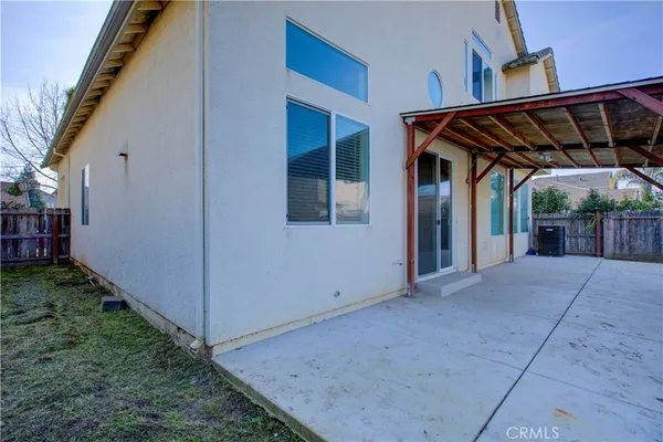 a view of backyard with small cabin