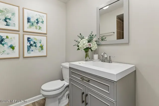 a bathroom with a sink and a toilet