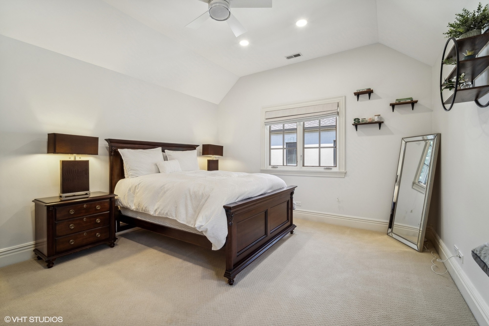 630 Forest Road Glenview, IL 60025 - Photo 27 of 44 a bedroom with a bed dresser and a window