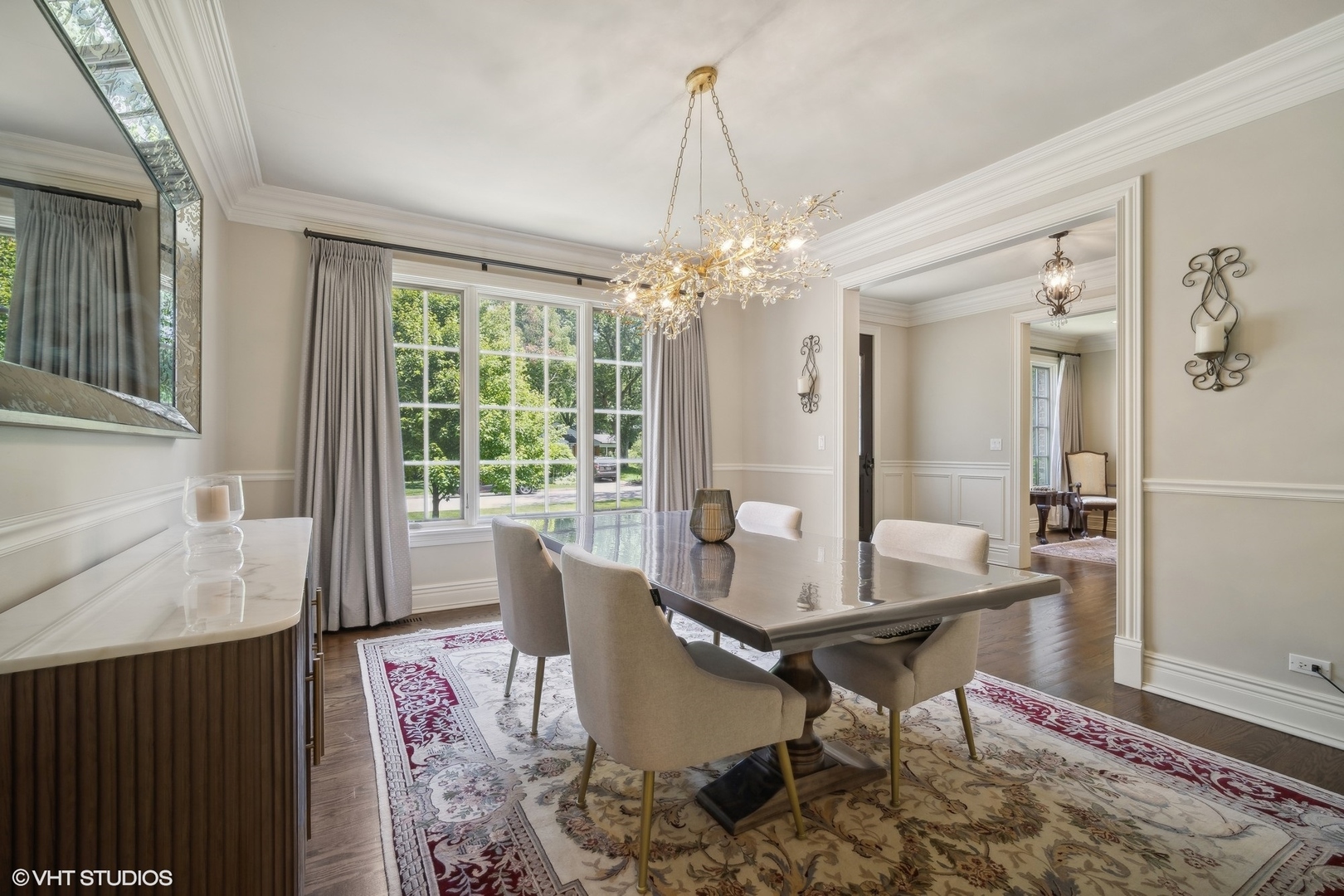 630 Forest Road Glenview, IL 60025 - Photo 4 of 44 a workspace with furniture and a chandelier