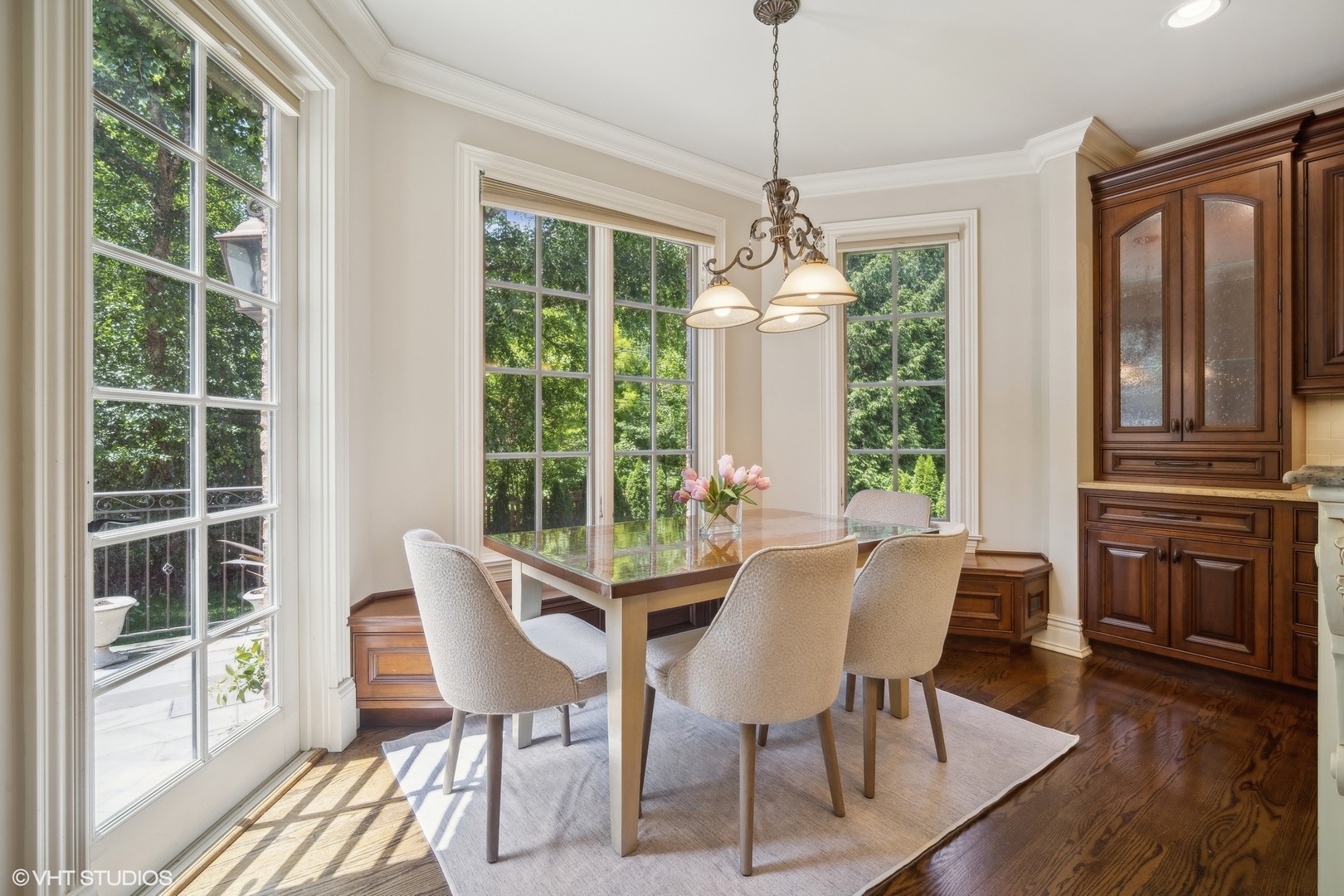 630 Forest Road Glenview, IL 60025 - Photo 8 of 44 a view of a dining room with furniture window and wooden floor