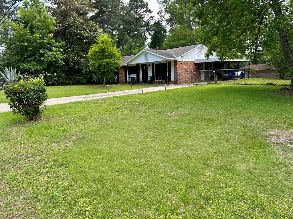 3245 Doyle Avenue Columbus, GA 31907 - Photo 15 of 21 a view of a house with a yard porch and sitting area