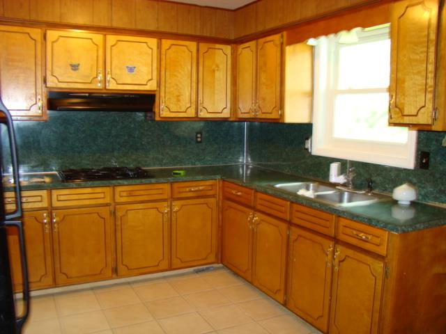 3245 Doyle Avenue Columbus, GA 31907 - Photo 3 of 21 a bathroom with a sink and a mirror