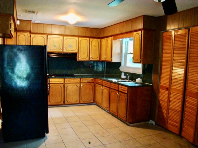 3245 Doyle Avenue Columbus, GA 31907 - Photo 6 of 21 a kitchen with stainless steel appliances granite countertop a stove a sink and a refrigerator