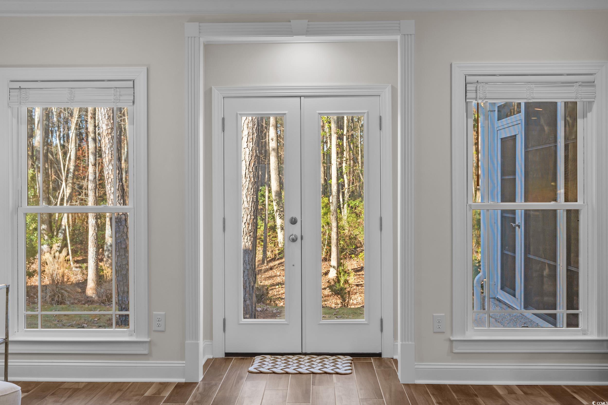 3021 Moss Bridge Lane Myrtle Beach, SC 29579 - Photo 11 of 40 Entryway with french doors and wood finish floors