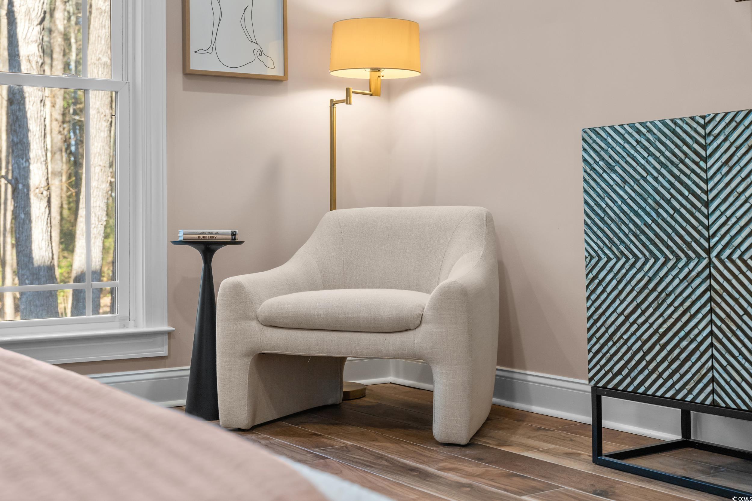 3021 Moss Bridge Lane Myrtle Beach, SC 29579 - Photo 21 of 40 Sitting room with dark wood-style floors and baseboards