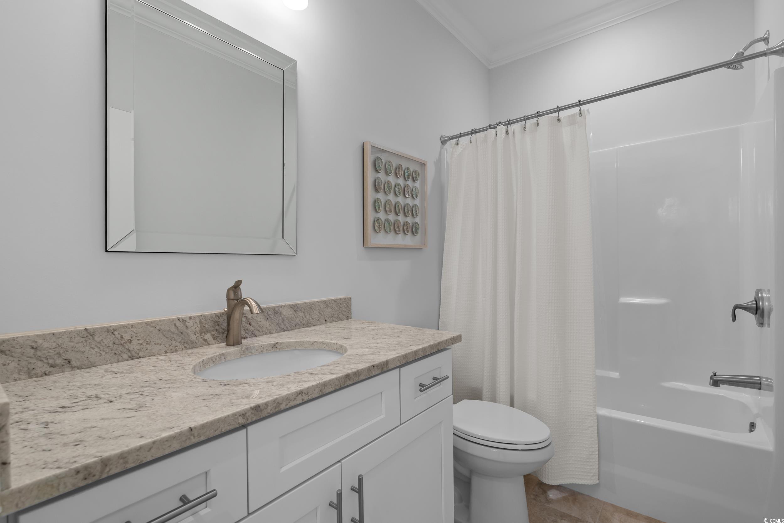 3021 Moss Bridge Lane Myrtle Beach, SC 29579 - Photo 26 of 40 Bathroom with shower / bathtub combination with curtain, vanity, and crown molding