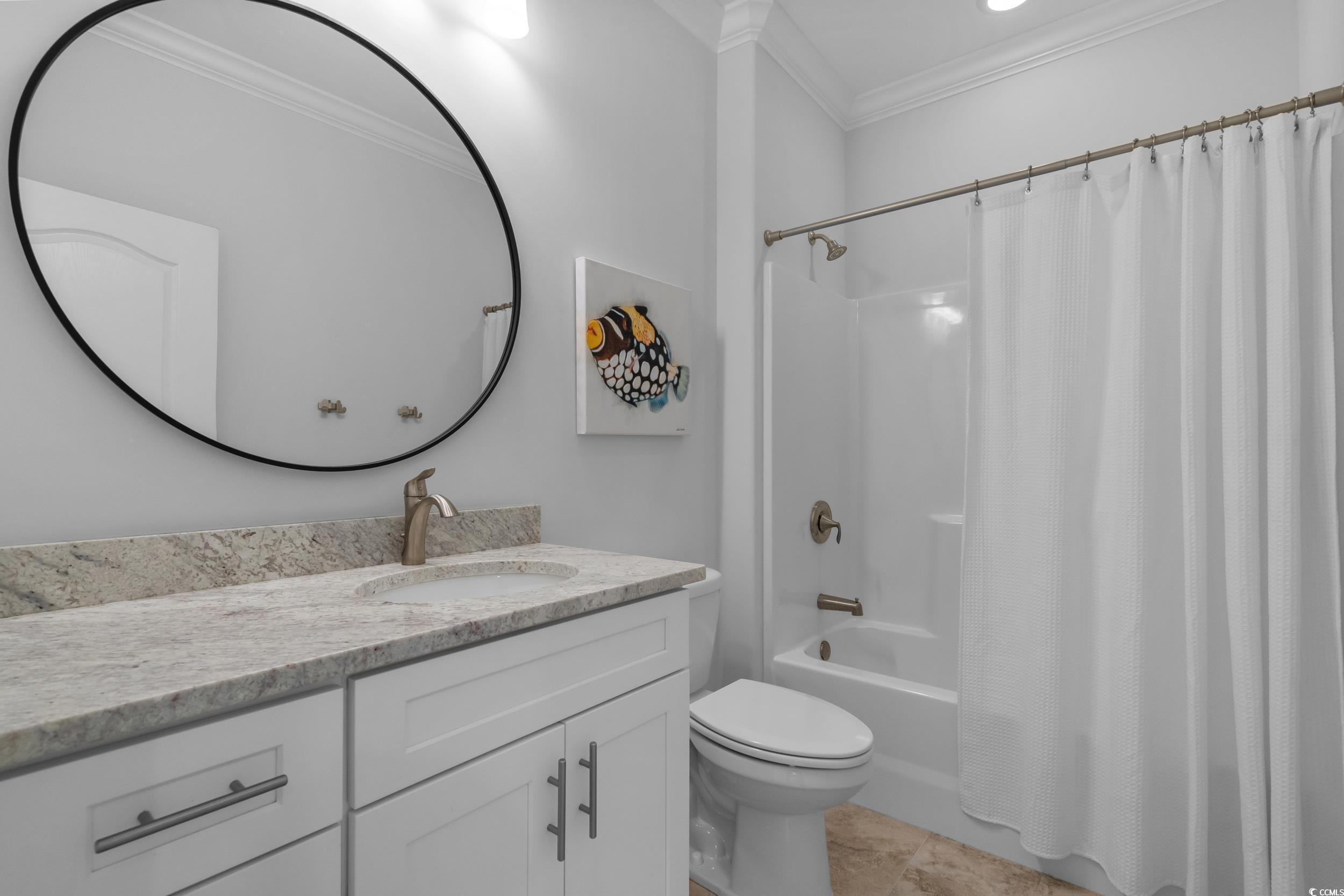 3021 Moss Bridge Lane Myrtle Beach, SC 29579 - Photo 30 of 40 Bathroom featuring shower / bath combination with curtain, vanity, and crown molding