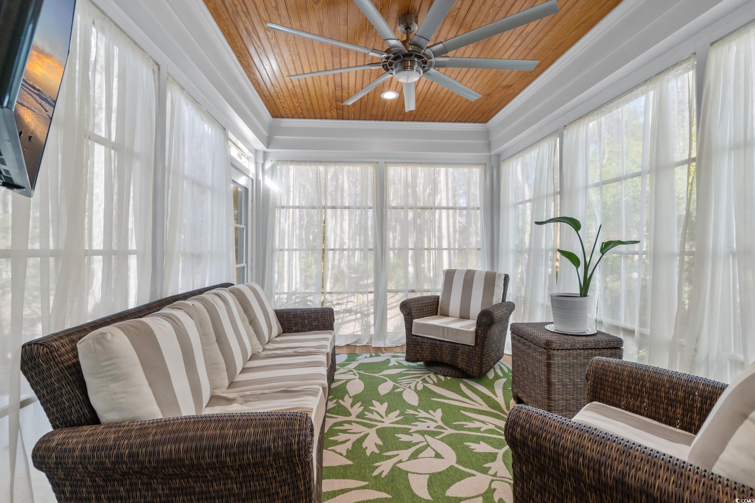 3021 Moss Bridge Lane Myrtle Beach, SC 29579 - Photo 33 of 40 Sunroom with wooden ceiling, ornamental molding, and healthy amount of natural light