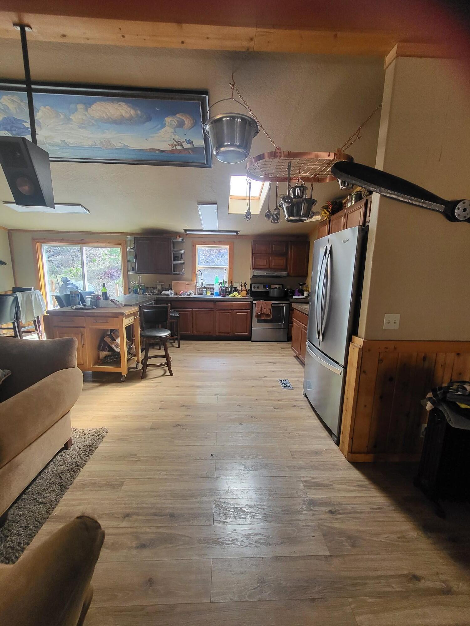 962 Indian Creek Road Selma, OR 97538 - Photo 15 of 42 standing in the living room, looking into the kitchen