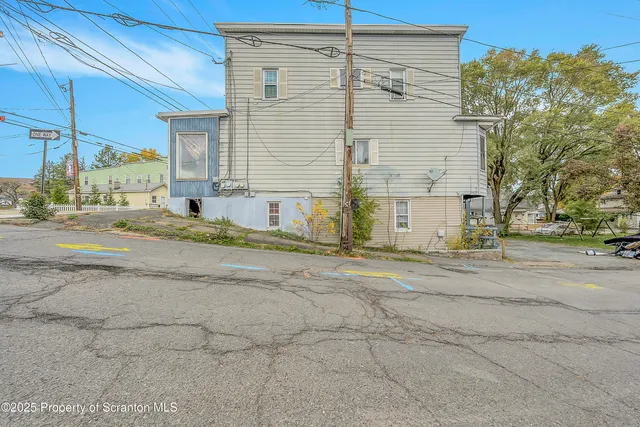 a view of a house with a patio