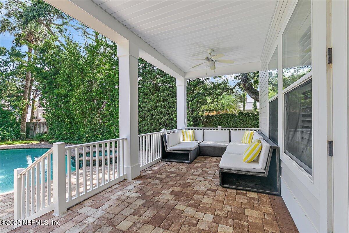 321 Fifth Street Atlantic Beach, FL 32233 - Photo 17 of 33 a outdoor space with patio the couches and a dining table with garden view