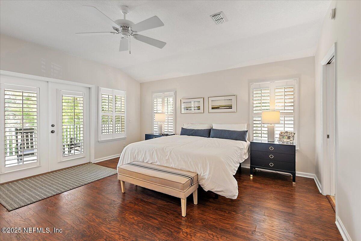 321 Fifth Street Atlantic Beach, FL 32233 - Photo 20 of 33 a bed room with a bed and a window