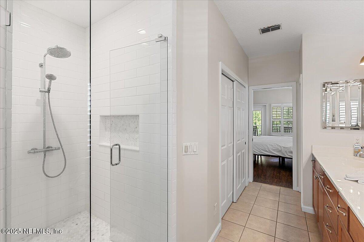 321 Fifth Street Atlantic Beach, FL 32233 - Photo 23 of 33 a bathroom with a shower