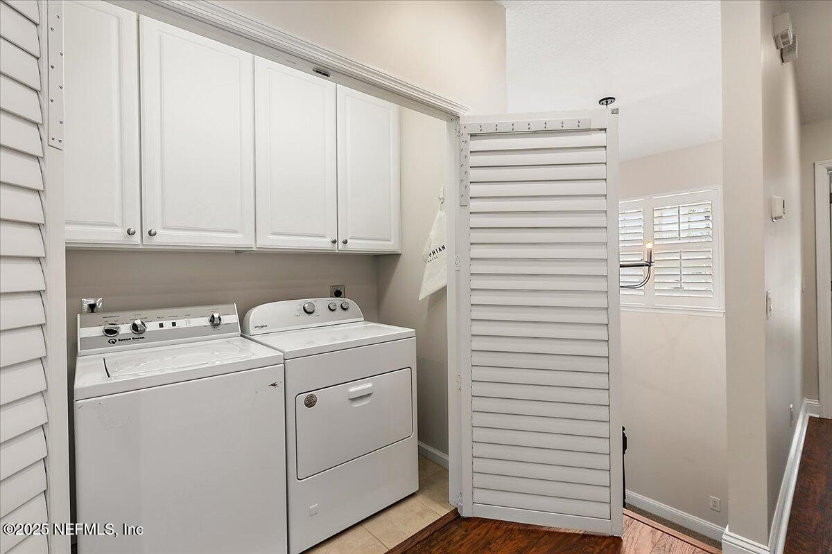321 Fifth Street Atlantic Beach, FL 32233 - Photo 28 of 33 a view of storage and utility room with washer and dryer