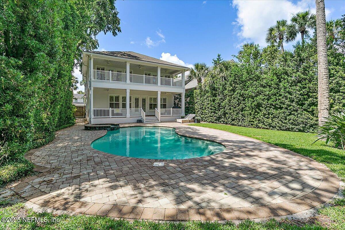 321 Fifth Street Atlantic Beach, FL 32233 - Photo 3 of 33 a view of a house with a yard and potted plants