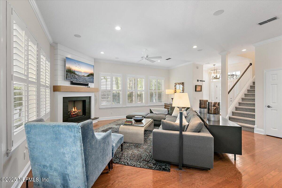 321 Fifth Street Atlantic Beach, FL 32233 - Photo 9 of 33 a living room with furniture and a fireplace