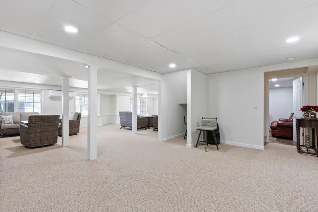 a view of a livingroom with furniture and a couch