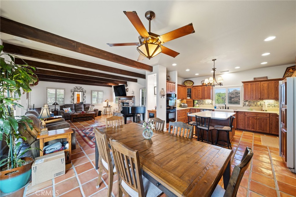 26487 Thacker Drive Hemet, CA 92544 - Photo 31 of 60 a view of a dining area with furniture and a rug