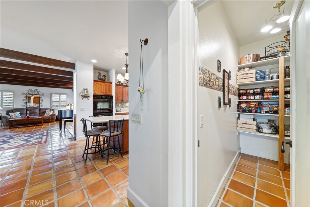 26487 Thacker Drive Hemet, CA 92544 - Photo 36 of 60 a room with furniture a rug and a window