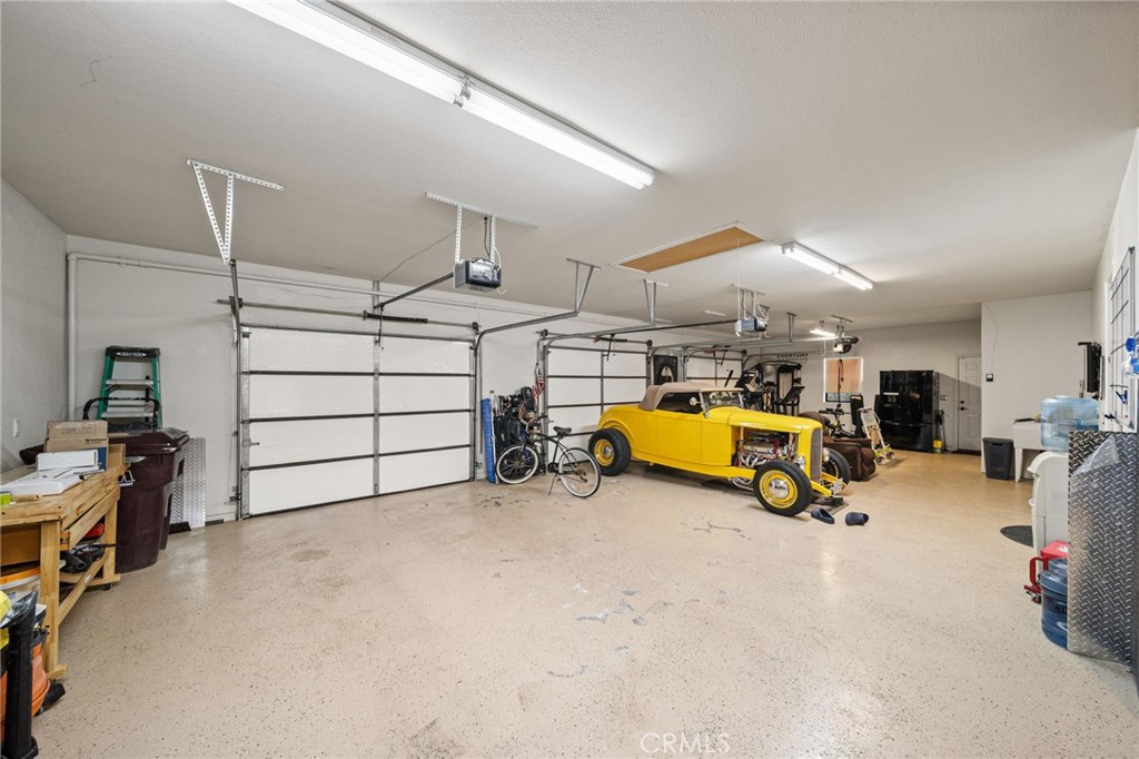 26487 Thacker Drive Hemet, CA 92544 - Photo 57 of 60 a view of a garage with furniture and other equipment