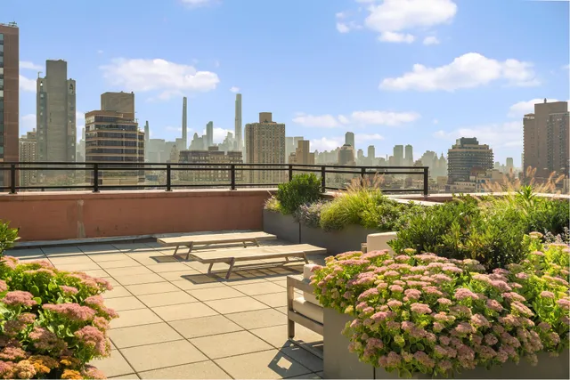 a view of balcony with furniture