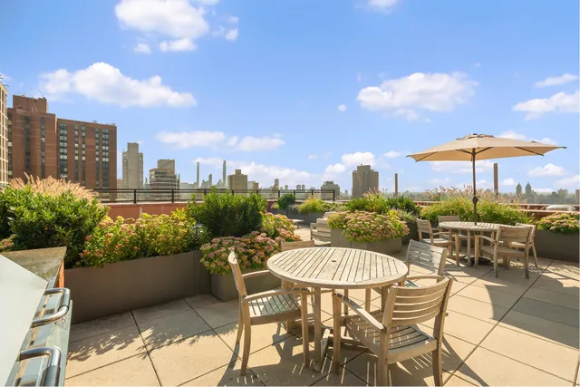 a view of a terrace with sitting area