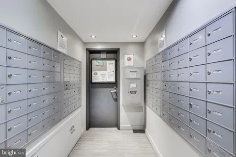 a view of a patio with dining table and chairs with a barbeque grill and plants