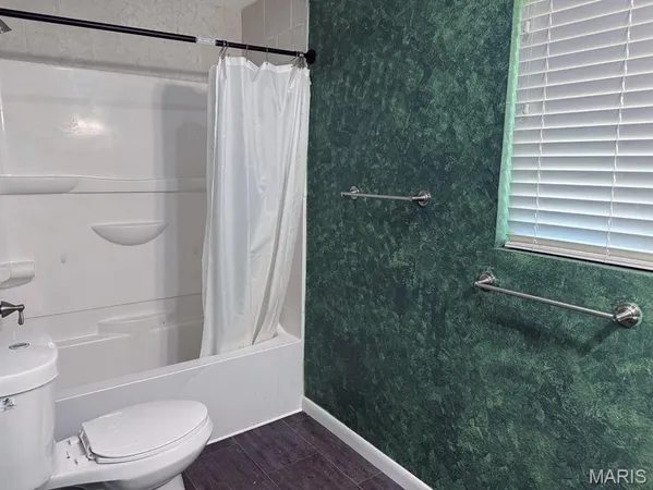 $229,900 | 1014 North Woodland Drive, Dexter, MO 63841