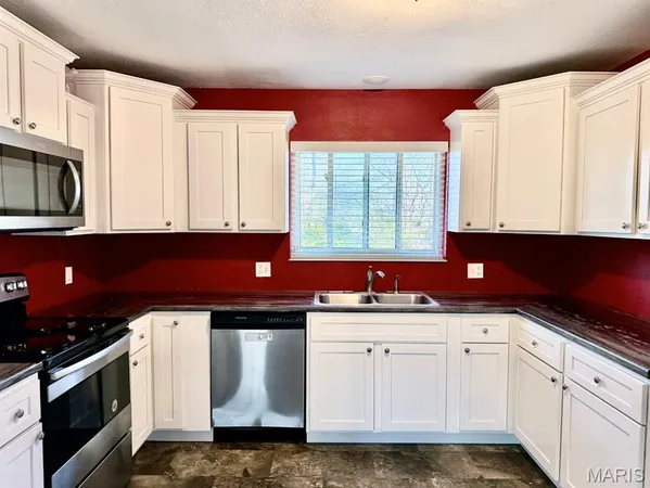 $229,900 | 1014 North Woodland Drive, Dexter, MO 63841