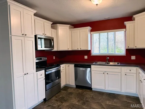 $229,900 | 1014 North Woodland Drive, Dexter, MO 63841