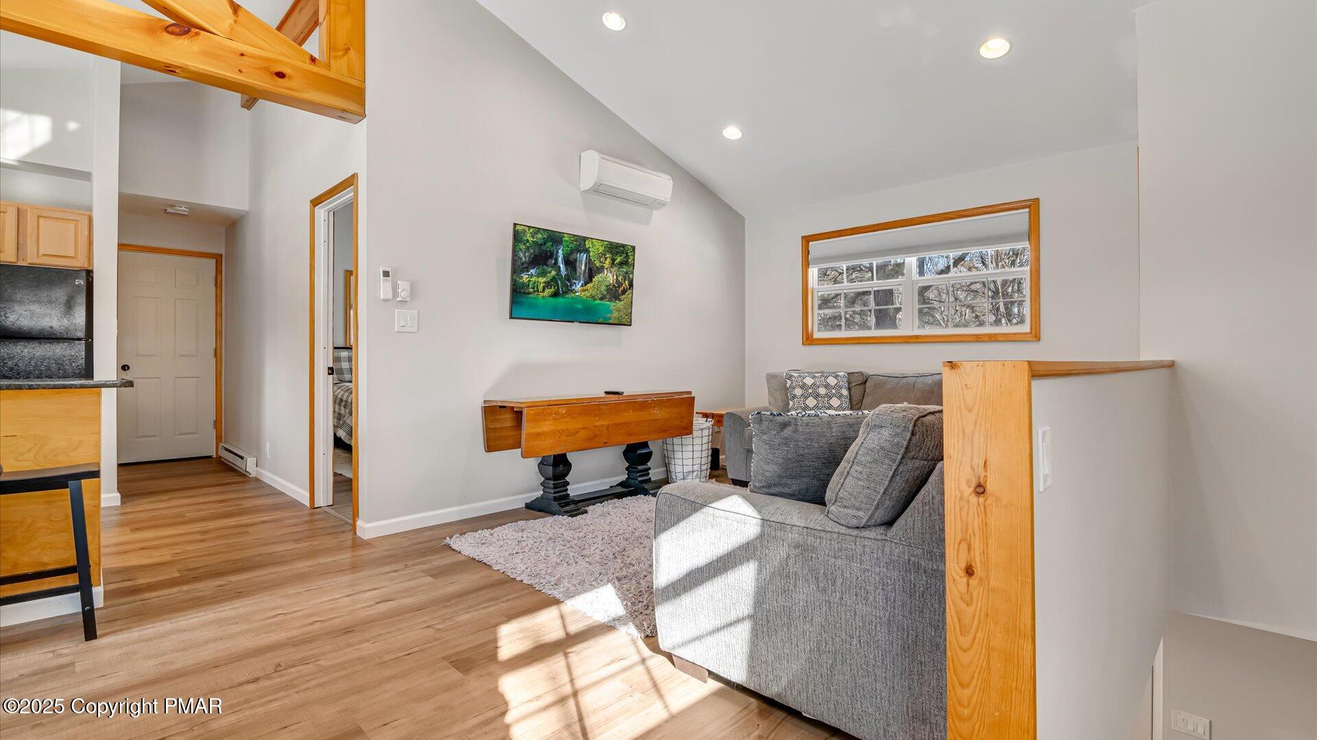 277 Fern Ridge Road Blakeslee, PA 18610 - Photo 3 of 46 a bed room with a bed and a television