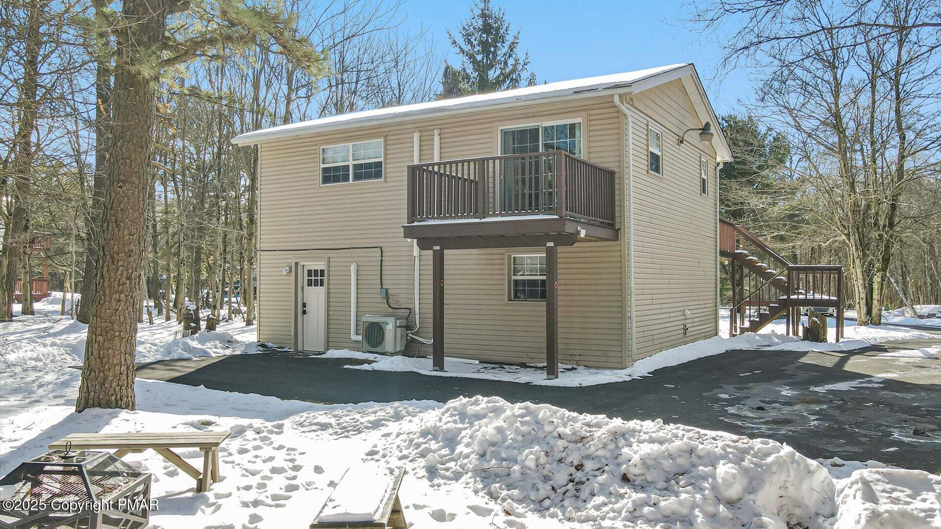 277 Fern Ridge Road Blakeslee, PA 18610 - Photo 33 of 46 a front view of a house with a yard